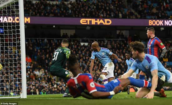 Fernandinho (25) of Manchester City scores an own goal which brings Crystal Palace level late on during Saturday's game.