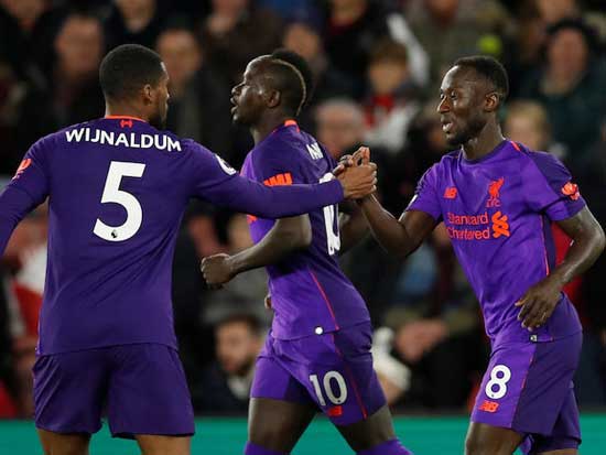 Liverpool's Naby Keïta (8) celebrates scoring the equalizer with teammates Sadio Mane and Wijnaldum. Reuters photo