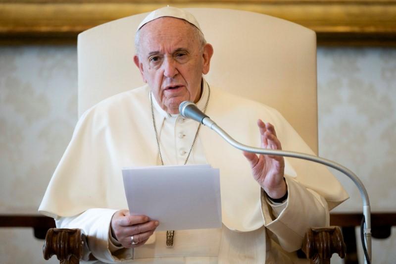 ope Francis speaks during his general audience as it is streamed via video over the internet from a library inside the Vatican, March 18, 2020. Vatican Media/Handout. Reuters image
