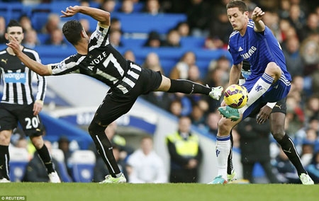 Perez tries to steer the ball away from Chelsea's Serbian midfielder Nemanja Matic at Stamford Bridge