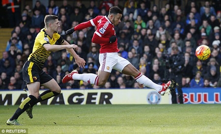 Memphis Depay (red top) converts Ander Herrera's cross on the volley to give Manchester United an early lead 