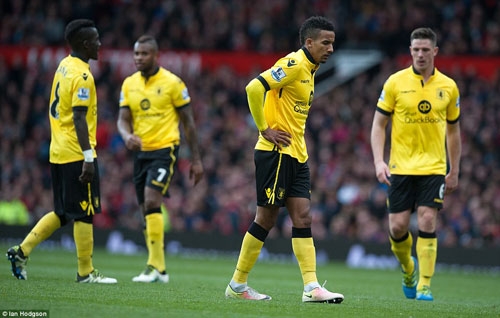 Dejected Aston Villa players after losing to Manchester Utd.