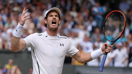 Andy Murray celebrates during his men's singles final match against Canada's Milos Raonic at Wimbledon on July 10, 2016.