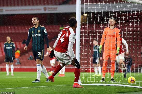 Arsenal skipper Aubameyang (14) seals his hat-trick after heading home unmarked at the back post on Sunday against Leeds United.