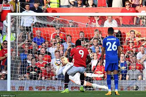 Leicester City's Kasper Schmeichel saves Romelu Lukaku's penalty kick at the 70th minute mark to deny him the opener.