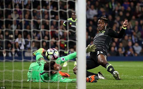 Late substitute Michy Batshuayi tucks the ball past Ben Foster to help Chelsea secure the Premier League title.