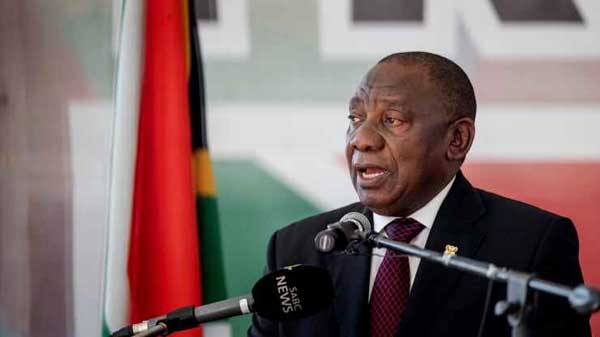 South African President Cyril Ramaphosa addresses the crowd gathered at the Miki Yili Stadium, ahead of the celebrations for the 25th anniversary of Freedom Day, in Makhanda, Eastern Cape Province on April 27, 2019. MICHELE SPATARI | AFP |