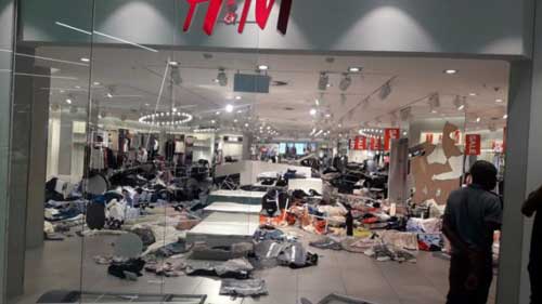 outh African protesters ransack H&M stores over “racist” ad. Image credit - thezimbabwemail