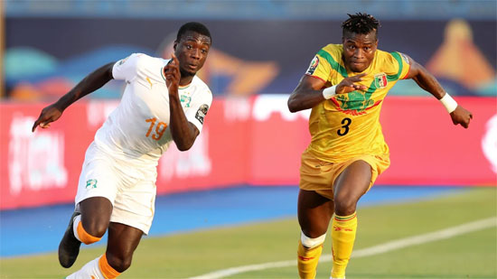 Nicolas Pepe of Ivory Coast challenged by Youssou Kone of Mali during the 2019 Africa Cup of Nations Finals last 16 match between Mali and Ivory Coast at Suez Stadium, Suez, Egypt on 08 July 2019 ©Samuel Shivambu/BackpagePix