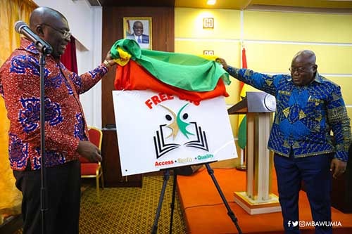 President Akufo-Addo and Vice President M. Bawumia posing with the newly minted free SHS logo.