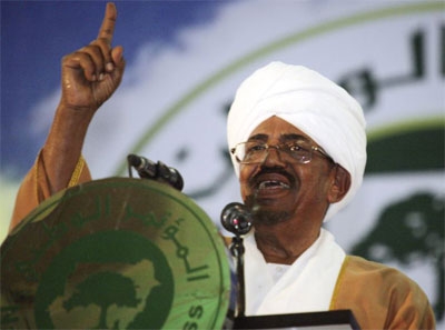Sudanese President Omar Hassan al-Bashir addresses the general conference of the ruling National Congress Party in Khartoum, Oct. 23, 2014.