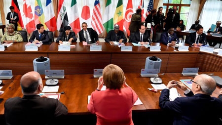 G7 warns Russia of more sanctions, pledges climate action
